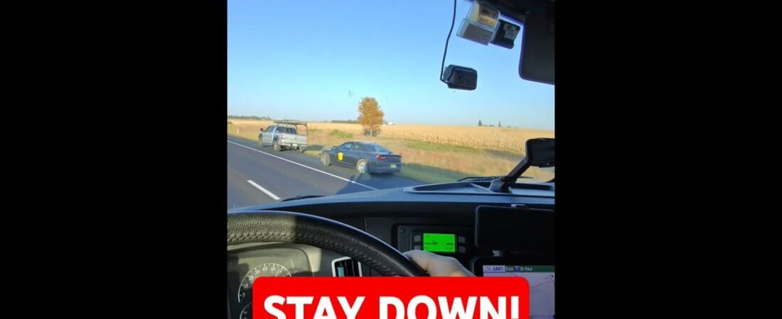 Trucker takes you on a wild ride through a real police shootout on the highway. Stay down and calm!
