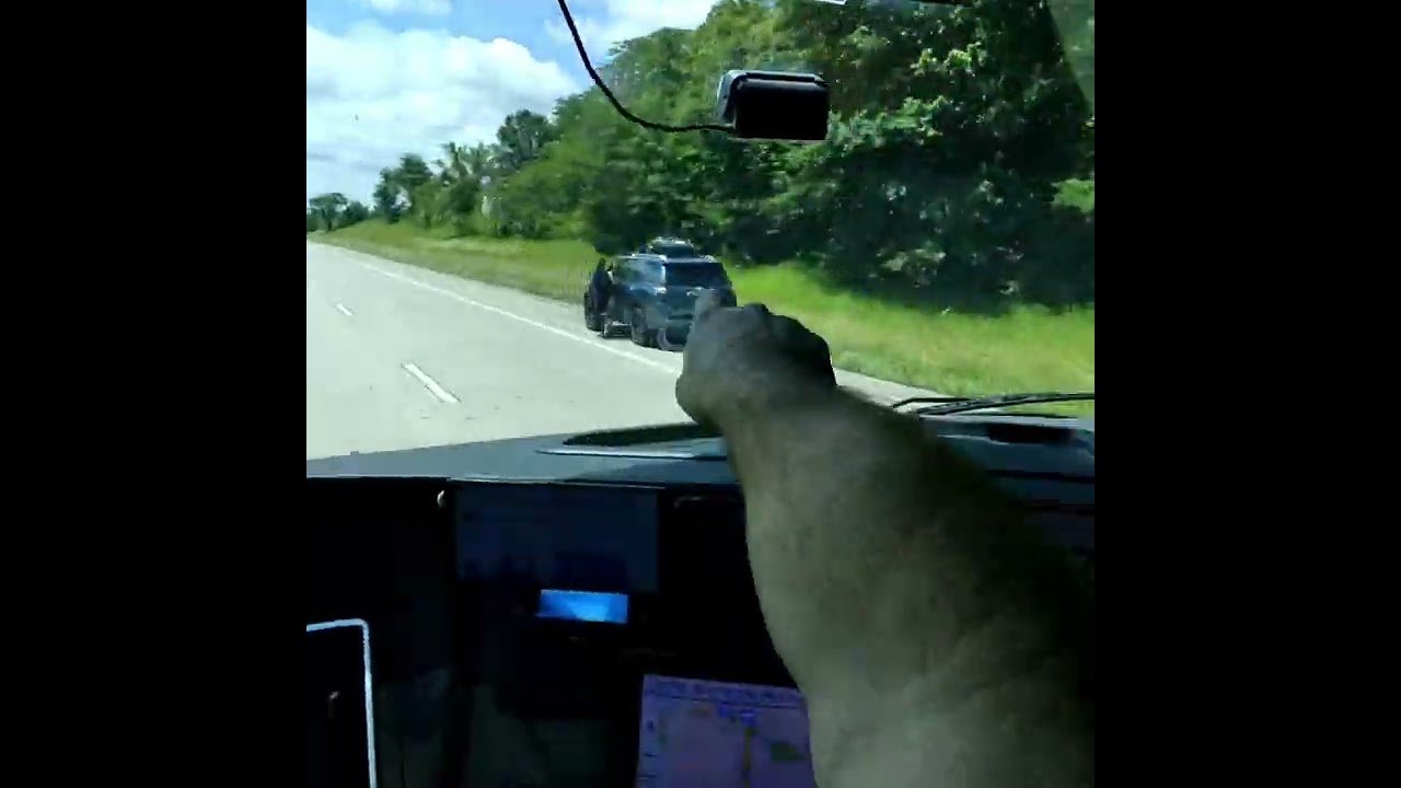 SUV OPENS FIRE AT TRUCK DRIVER! Highway dangers of driving a Big Rig in a Major City! Always Duck!
