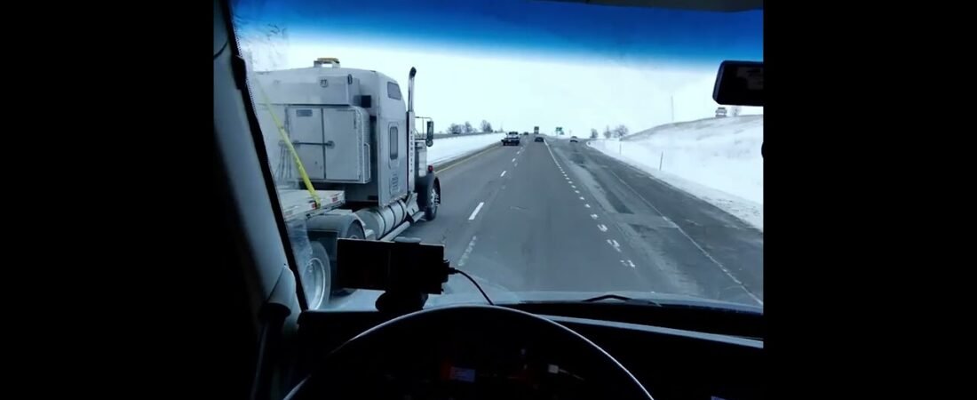 Watch this High Speed Semi Truck Big Rig Driver st 120MPH on the Iowa 80 During Icy BLIZZARD. (1)