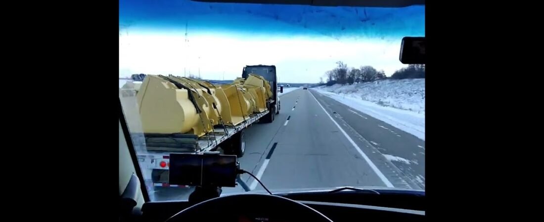 Watch this High Speed Semi Truck Big Rig Driver st 120MPH on the Iowa 80 During Icy BLIZZARD. (1)