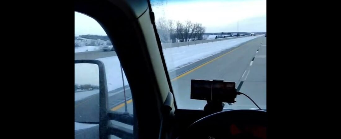 Watch this High Speed Semi Truck Big Rig Driver st 120MPH on the Iowa 80 During Icy BLIZZARD. (2)