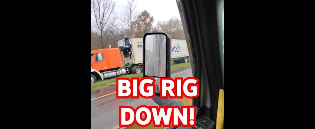 BIG RIG DOWN! Another semi truck falls victim to the sudden stops in the rain.
