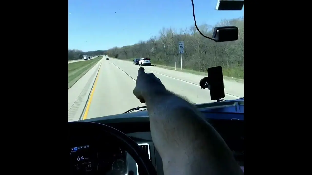 Car Chase on the highway ends right in front of this truck driver. Caught on camera! This is REAL!
