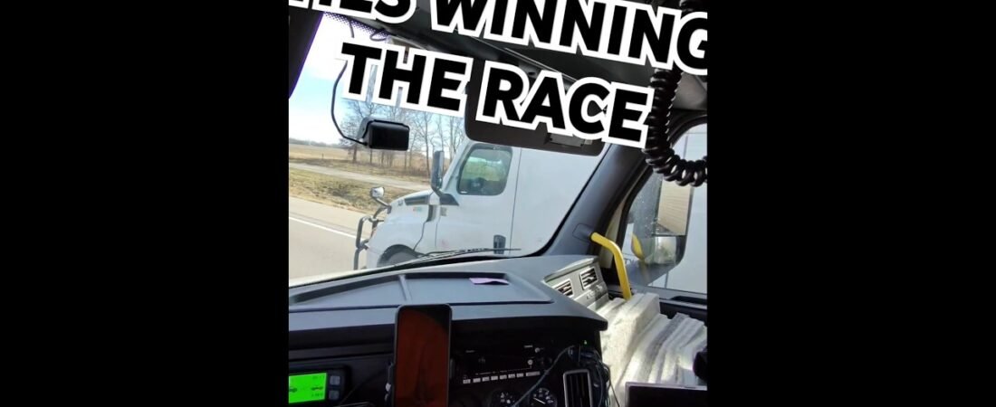 HE’S WINNING THE RACE WHILE ON HIS CELL PHONE!?