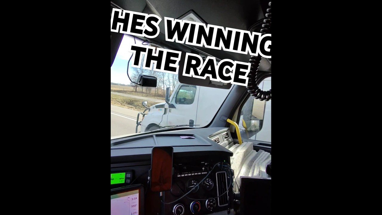 HE’S WINNING THE RACE WHILE ON HIS CELL PHONE!?