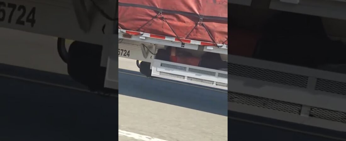 Hitching a Ride on a Flatbed Semi Trailer. Who would do this? What would you do?
