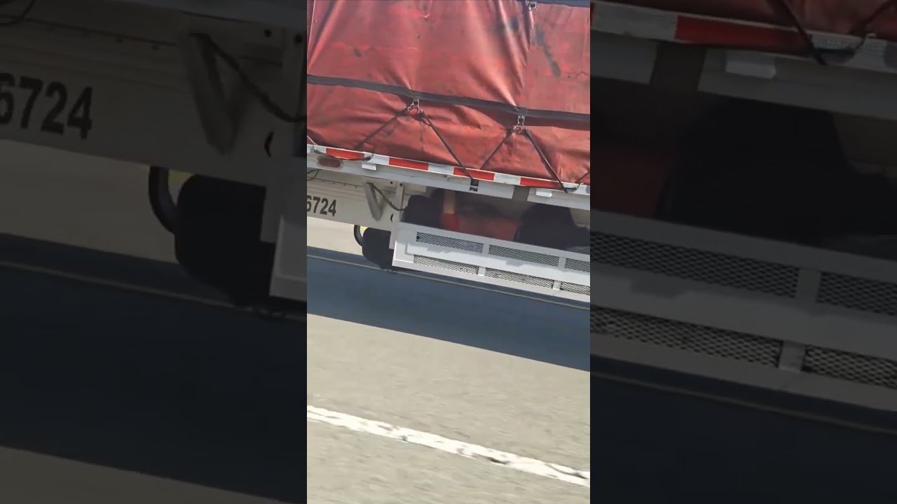 Hitching a Ride on a Flatbed Semi Trailer. Who would do this? What would you do?