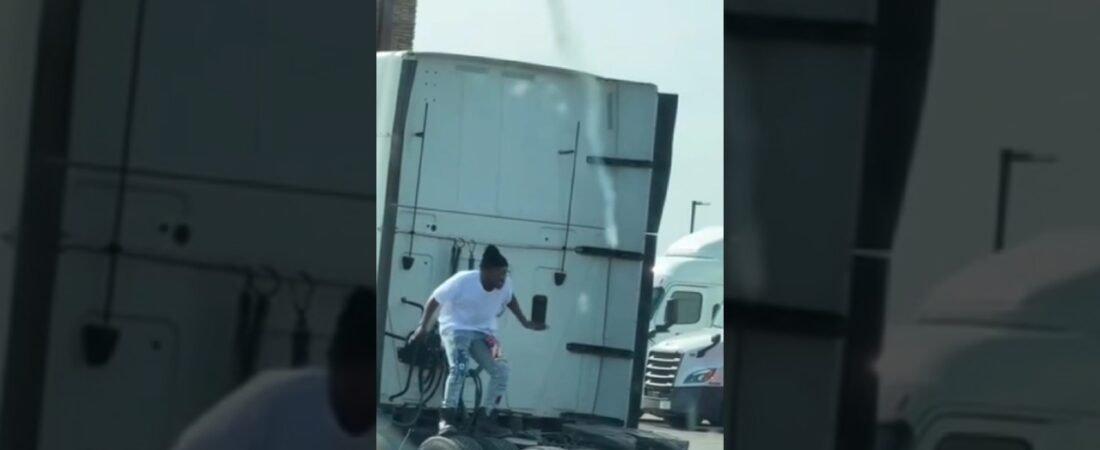 Is he making a Rap Video at the truck stop?