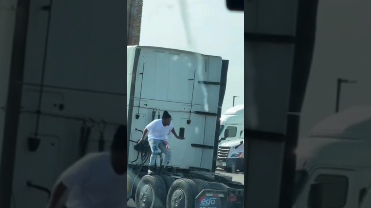 Is he making a Rap Video at the truck stop?