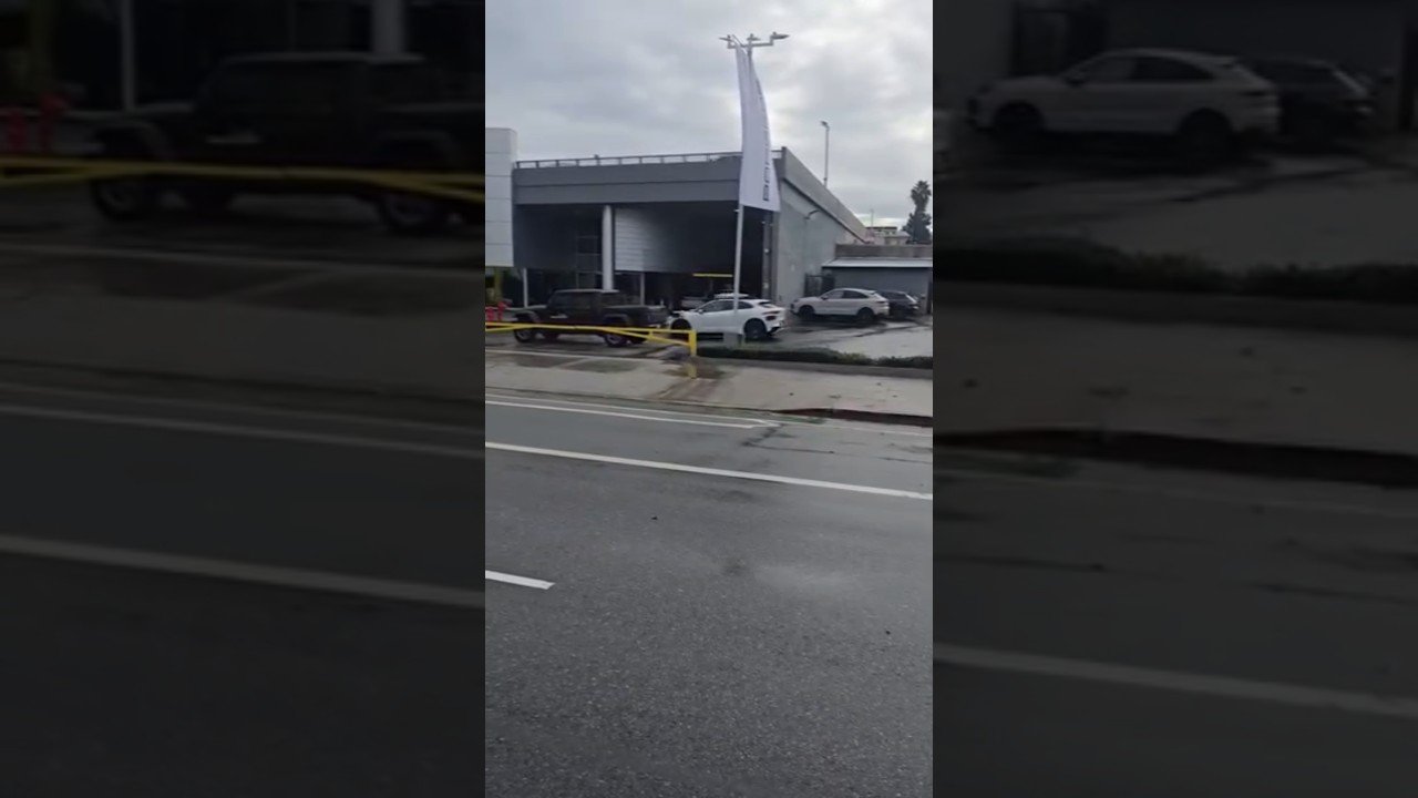 ROBOT CAR GETS STUCK IN PARKING LOT.