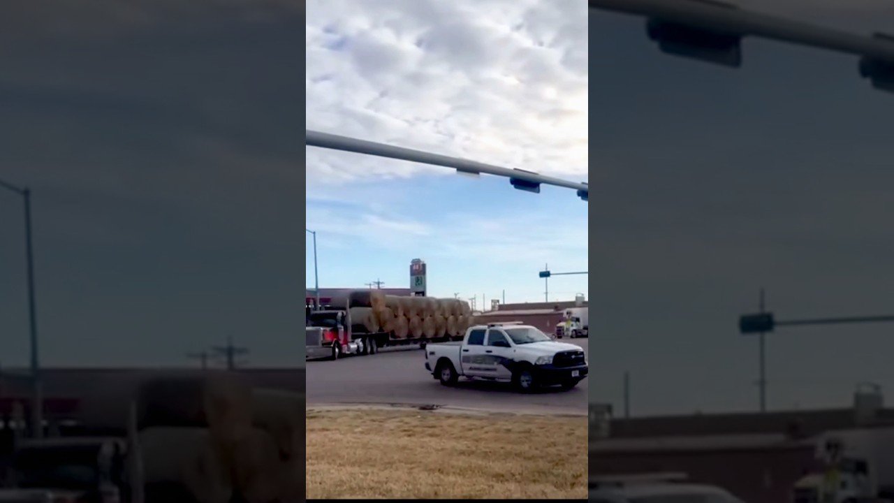 THE MOST AMERICAN TRUCKER VIDEO EVER MADE. 50 SEMI TRUCKS GET A POLICE ESCORT THROUGH TOWN.