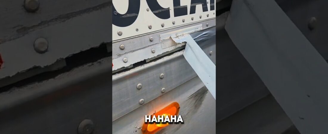 THEY USED DUCT TAPE TO HIDE THE DAMAGE. This semi trailer is totalled.