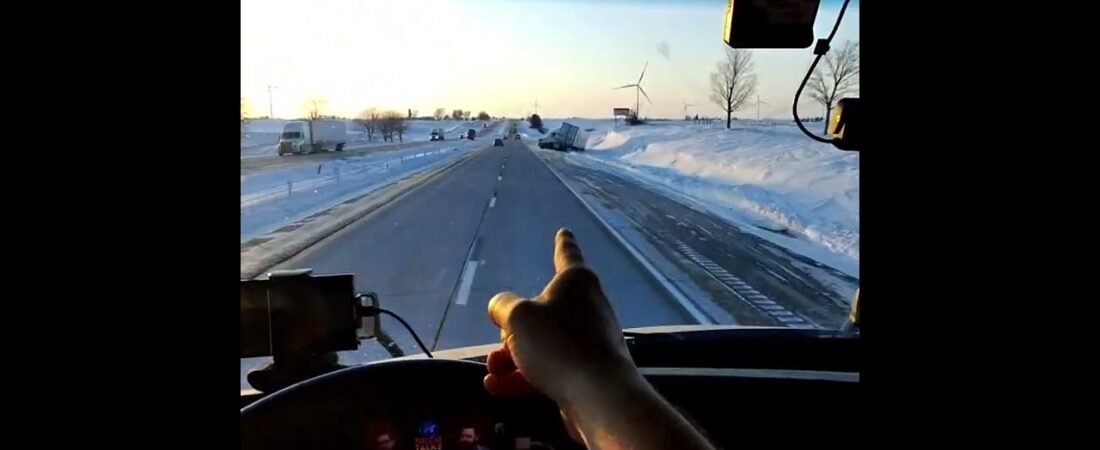 TRUCKER is driving in the fast lane speeding while holding a camera recording NOTHING for YouTube.