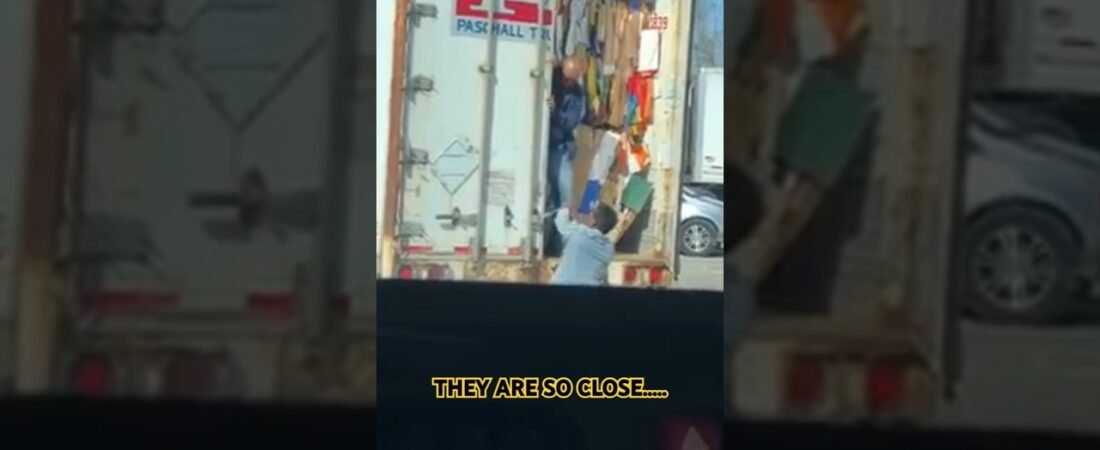 Team Drivers couldn’t open this trailer door. Could you open this door? What are they doing wrong?