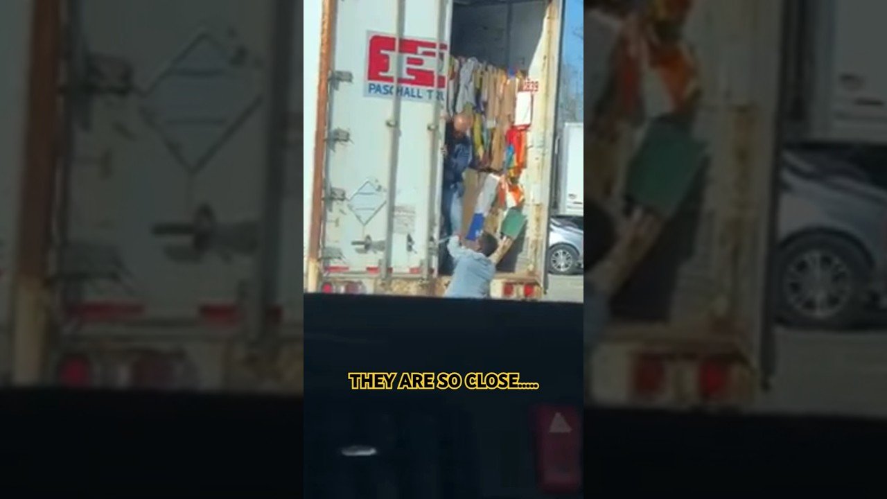 Team Drivers couldn’t open this trailer door. Could you open this door? What are they doing wrong?