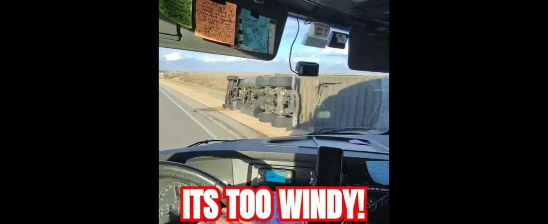 The wind pushed this semi truck over on its side. This is a VERY scary part of trucking.
