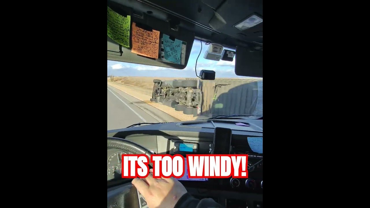 The wind pushed this semi truck over on its side. This is a VERY scary part of trucking.