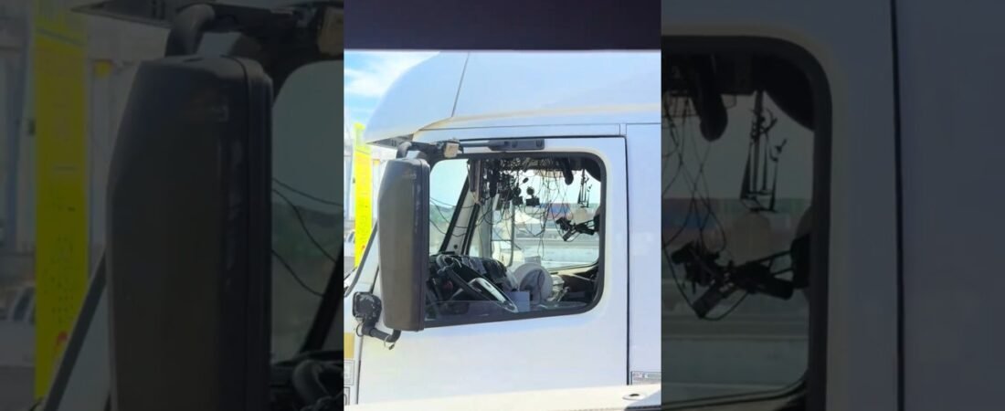 This TRUCKER is doing everything except driving!