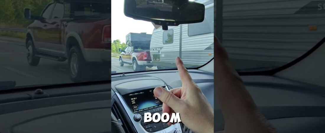 This pickup truck has a BOOM BOOM room on top of it.