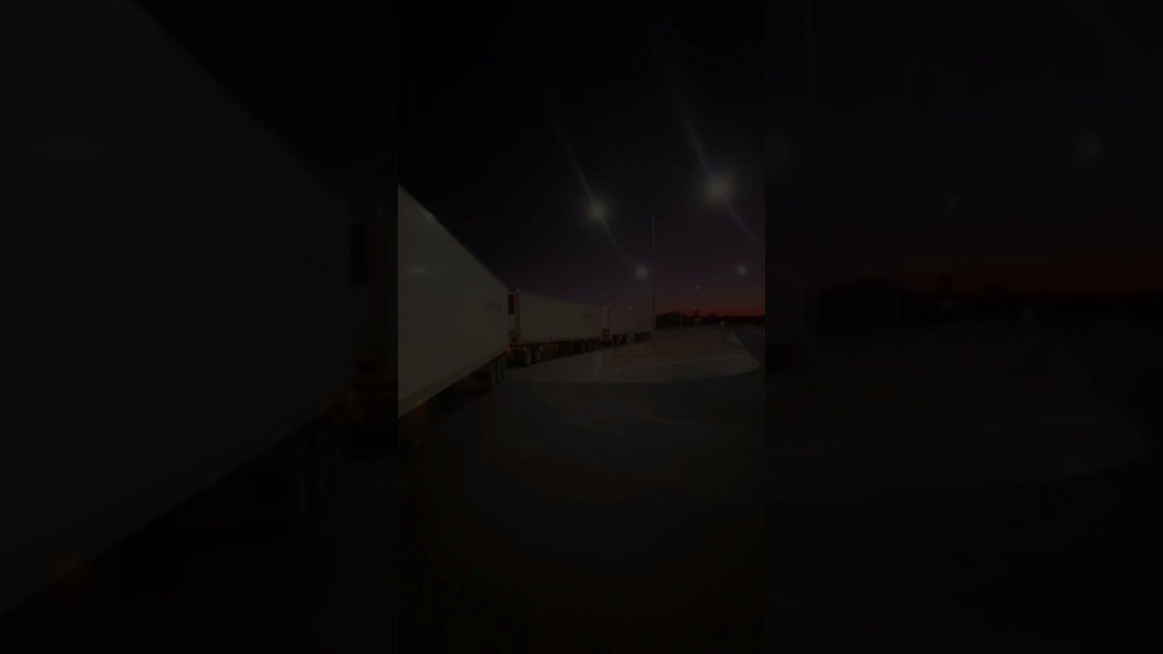 Truckers riding off into the sunset like modern day cowboys.