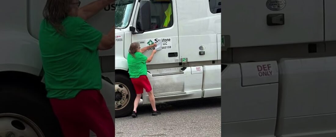 What on earth is this woman doing at the truck stop?