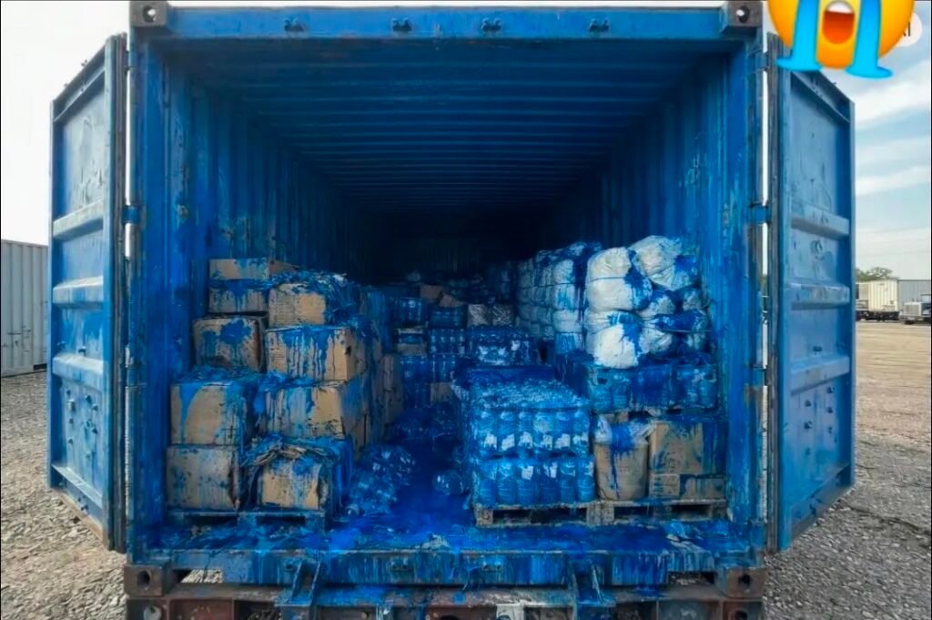 2 DOCK WORKERS QUIT TODAY AFTER THE TRAILER DYE PACK MISFIRED AND COVERED THEM IN PERMANENT BLUE DYE.
