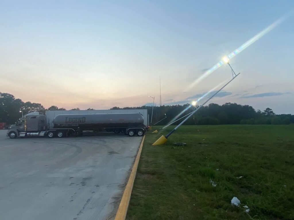 CRAZY HOW THEY INSTALL THESE LIGHT POSTS ALL LEANING BACK LIKE THAT.