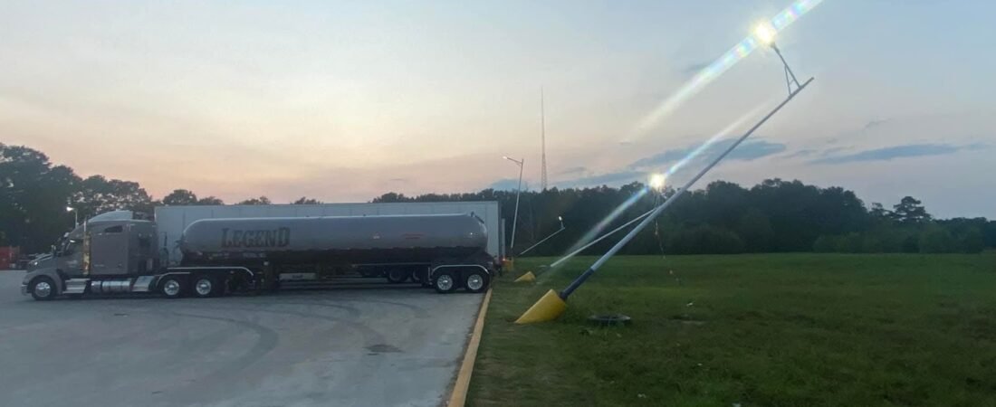 CRAZY HOW THEY INSTALL THESE LIGHT POSTS ALL LEANING BACK LIKE THAT.